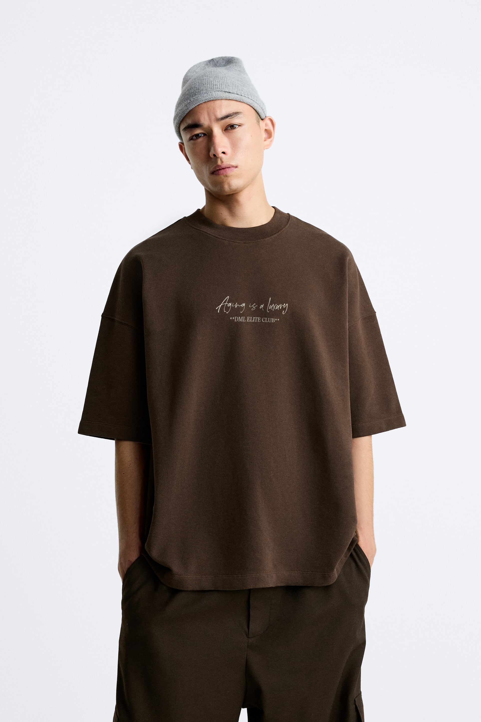 BROWN- AGING IS A LUXURY FRENCH TERRY OVERSIZED T-SHIRT