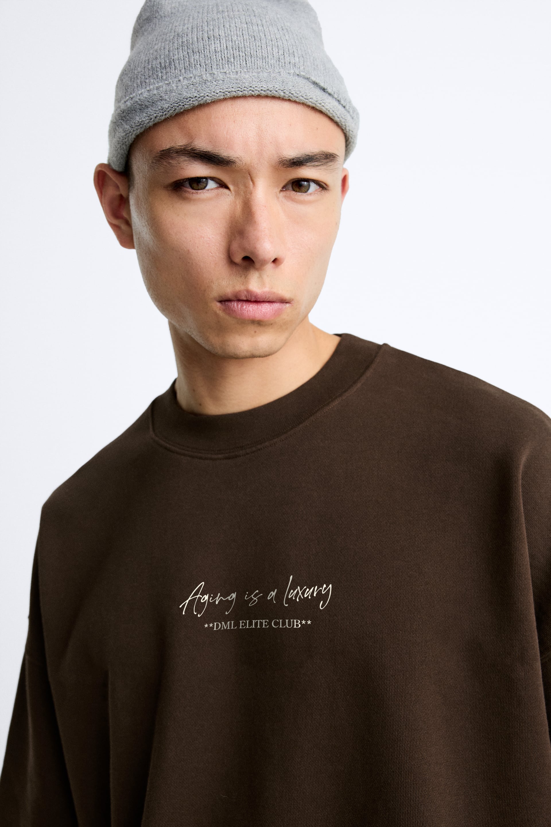 BROWN- AGING IS A LUXURY FRENCH TERRY OVERSIZED T-SHIRT