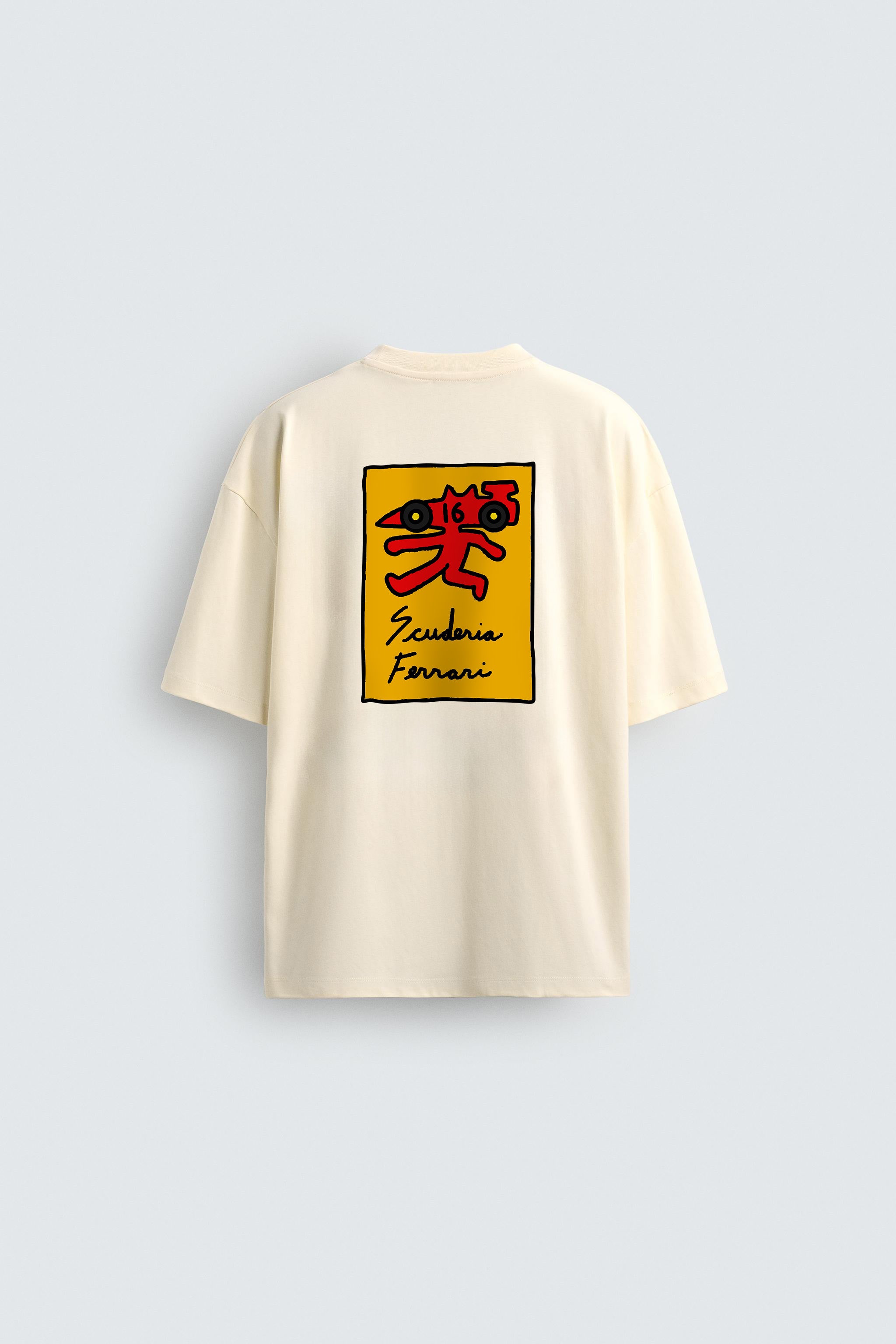 Beige t-shirt with a yellow square graphic and text on a light gray background