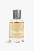 Perfume bottle labeled 'Tobacco Teak' on a white background