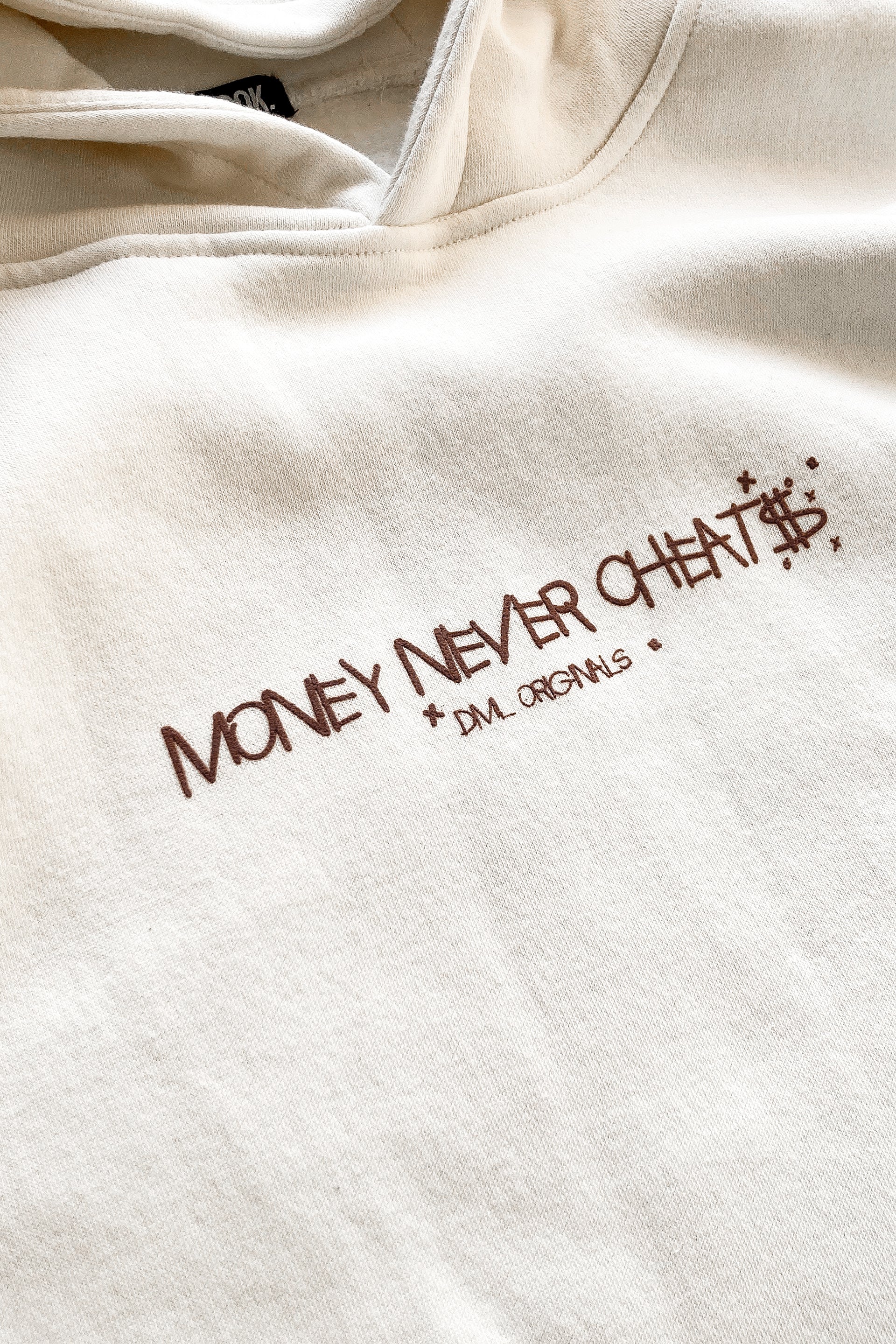 MONEY NEVER CHEATS OVERSIZED FIT HOODIE - OFF WHITE